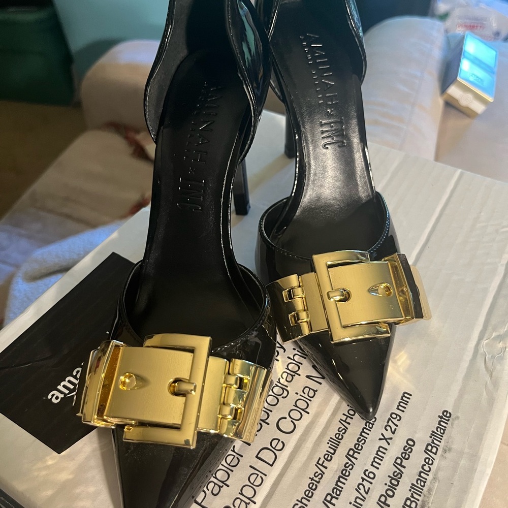 Luxurious Black and Gold Women's oversized buckle heels